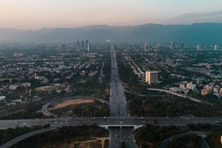 Aerial view of Islamabad roads and hills at dusk, Pakistan.