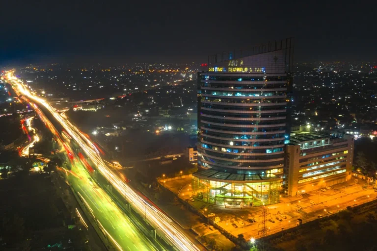 Night traffic near a tower in Lahore, Pakistan.