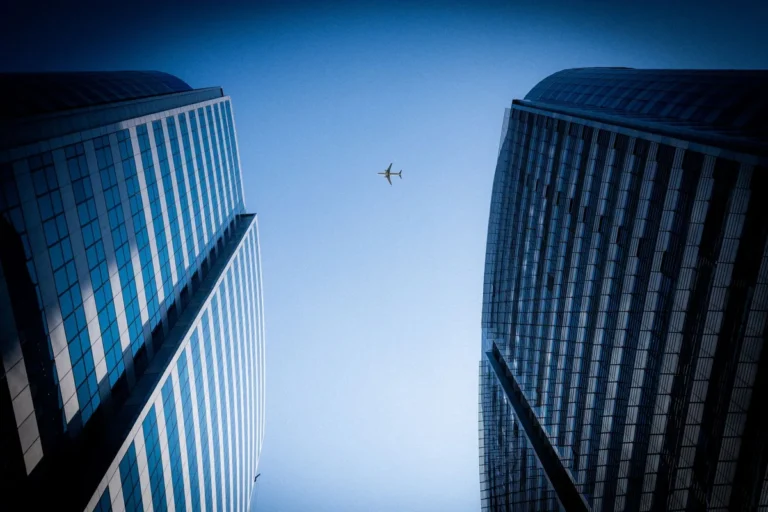 Aircraft above city buildings in Islamabad, Pakistan.